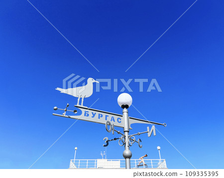 Burgas weathercock with zool city sign blue sky summer in port Burgas weathercock with zool city sign blue sky summer in port 109335395