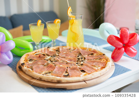 Pizza with ham and mushrooms homemade tasty italian. Pizza with ham and mushrooms homemade tasty italian. 109335428