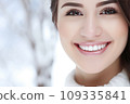 A Close-Up of a Woman's Smile with White Teeth 109335841