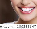A Close-Up of a Woman's Smile with White Teeth 109335847