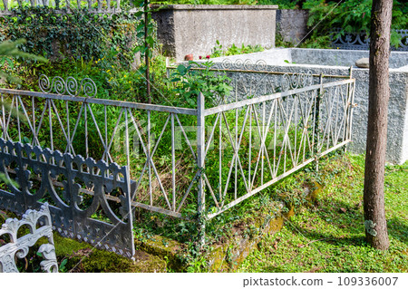 graves with metal fence on Erge cemetery in Batumi graves with metal fence on Erge cemetery in Batumi 109336007