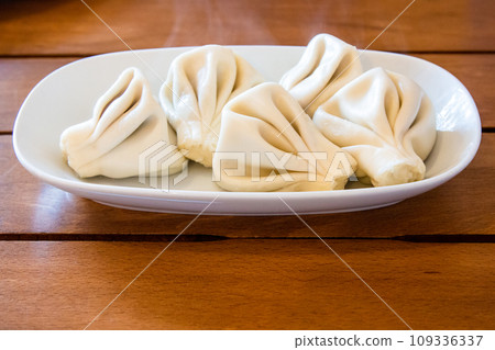 portion of boiled Khinkali (Georgian dumpling) portion of boiled Khinkali (Georgian dumpling) 109336337
