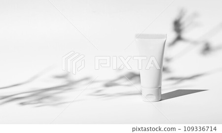 White blank cream tube mockup on banner background. Small cosmetic container 109336714
