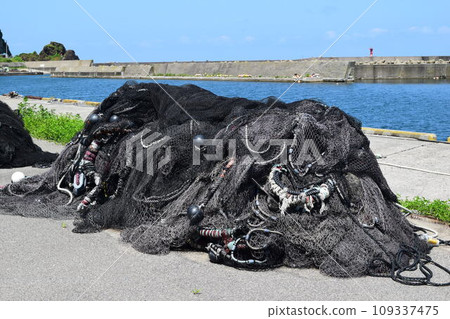 Fisherman's fishing gear placed in the fishing port Fisherman's fishing gear placed in the fishing port 109337475