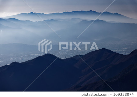Yatsugatake in the morning mist seen from the Omote Ginza Traverse Route in the Northern Alps Yatsugatake in the morning mist seen from the Omote Ginza Traverse Route in the Northern Alps 109338074