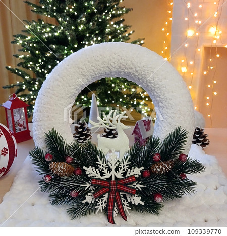 Christmas wreath with pine cones, spruce branches and stars Christmas wreath with pine cones, spruce branches and stars 109339770