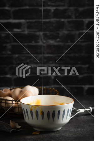 eggs in a metal pot on a black background eggs in a metal pot on a black background 109343441