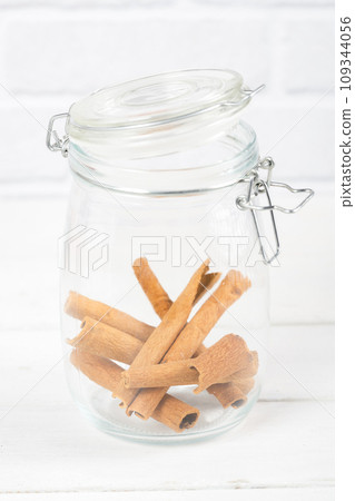 Spice spice cinnamon in glass bottle 109344056