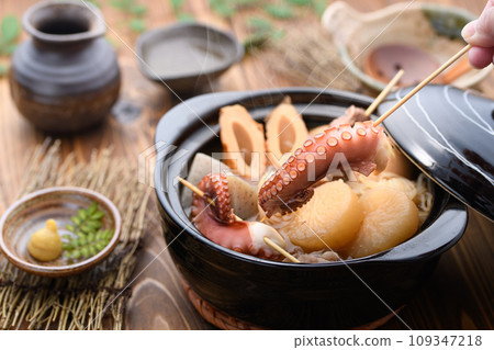 Oden with various ingredients simmered in a clay pot Oden with various ingredients simmered in a clay pot 109347218