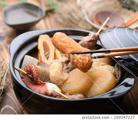 Oden with various ingredients simmered in a clay pot Oden with various ingredients simmered in a clay pot 109347227