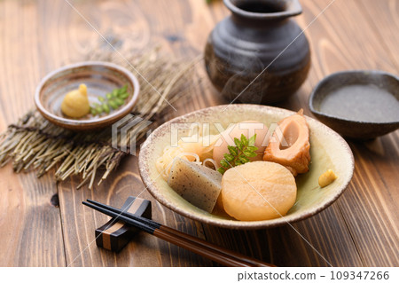 Oden served in small plates from a clay pot, served with mustard Oden served in small plates from a clay pot, served with mustard 109347266