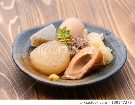 Oden divided into small plates, garnished with sansho leaves Oden divided into small plates, garnished with sansho leaves 109347276