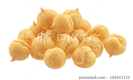 Small cookie drops, puff pastry balls isolated on white background Small cookie drops, puff pastry balls isolated on white background 109352135