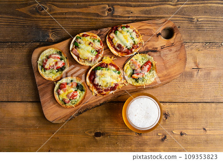 Mini pizza made with gyoza skins Mini pizza made with gyoza skins 109353823