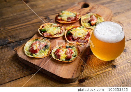 Mini pizza made with gyoza skins Mini pizza made with gyoza skins 109353825