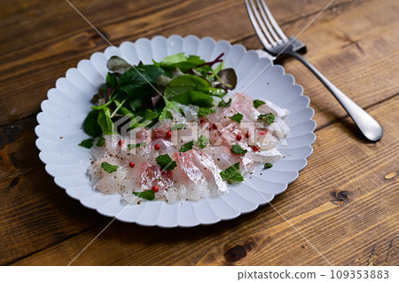Sea bream carpaccio, mint flavor Sea bream carpaccio, mint flavor 109353883