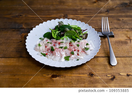 Sea bream carpaccio, mint flavor Sea bream carpaccio, mint flavor 109353885
