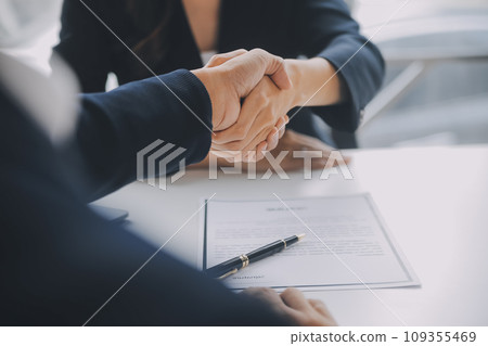 Close up view of job interview in office, focus on resume writing tips, employer reviewing good cv of prepared skilled applicant, recruiter considering application, hr manager making hiring decision Close up view of job interview in office, focus on resume writing tips, employer reviewing good cv of prepared skilled applicant, recruiter considering application, hr manager making hiring decision 109355469