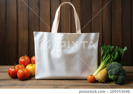 White linen bag with vegetables is placed on a rustic wooden background White linen bag with vegetables is placed on a rustic wooden background 109355646