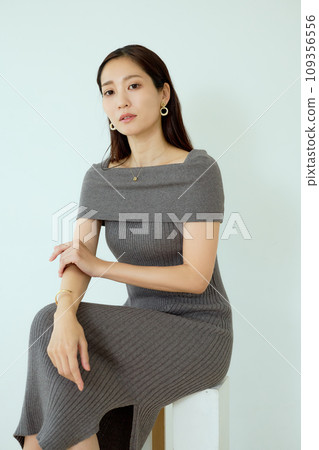 Woman in knit dress 109356556