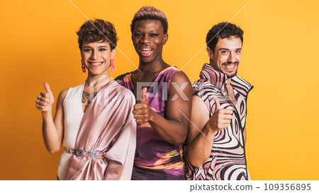 Three trans men gesturing to be fine with the thumb up on yellow 109356895
