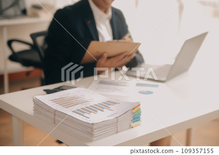 Business Documents, Auditor businesswoman checking searching document legal prepare paperwork or report for analysis TAX time,accountant Documents data contract partner deal in workplace office 109357155