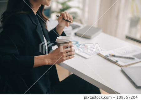Business Documents, Auditor businesswoman checking searching document legal prepare paperwork or report for analysis TAX time,accountant Documents data contract partner deal in workplace office Business Documents, Auditor businesswoman checking searching document legal prepare paperwork or report for analysis TAX time,accountant Documents data contract partner deal in workplace office 109357204