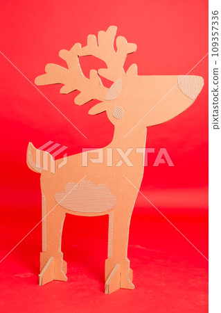 Deer from recycling cardboard. Space for text Deer from recycling cardboard. Space for text 109357336