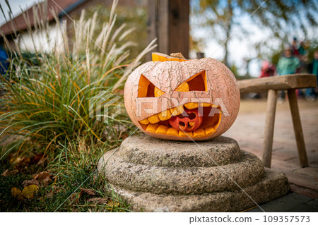 Jack O Lantern carved pumpin in autumn, kids decoration for Halloween 109357573