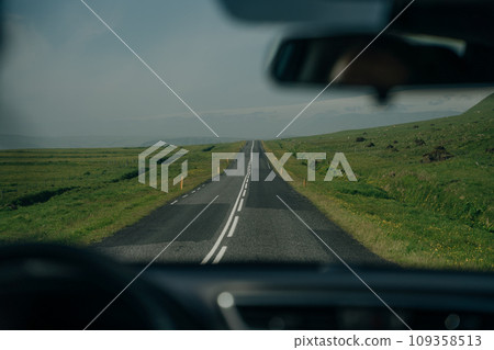 road in iceland the view from the car 109358513