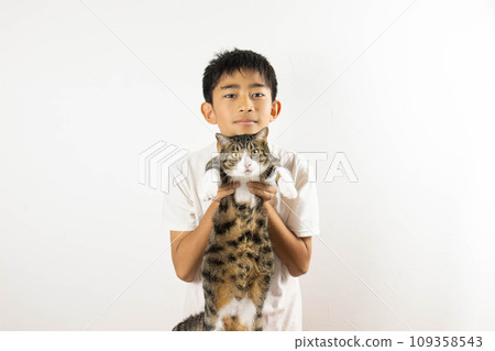 A man holding a cat 109358543