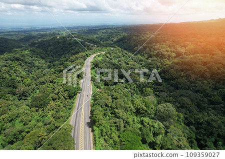 Wide asphalt road in junle background 109359027