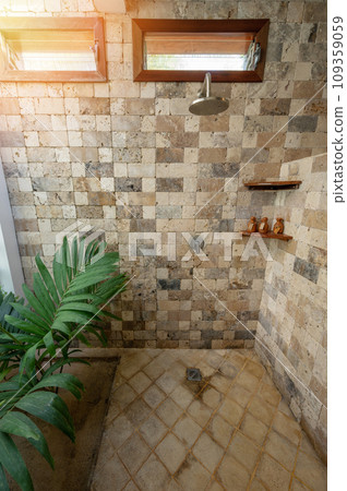 Luxury brown stone bathroom Luxury brown stone bathroom 109359059
