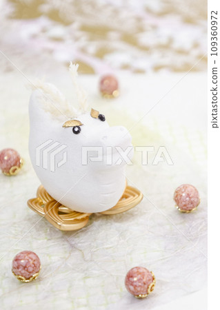 New Year's card material for the Year of the Dragon - soft pink design on a white background New Year's card material for the Year of the Dragon - soft pink design on a white background 109360972