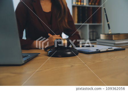 Lawyer, legal advisor, businessman brainstorming information on agreement details Business contracts in legal processing books for accuracy in contract documents. joint financial investment. Lawyer, legal advisor, businessman brainstorming information on agreement details Business contracts in legal processing books for accuracy in contract documents. joint financial investment. 109362056