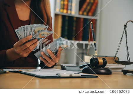 Lawyer, legal advisor, businessman brainstorming information on agreement details Business contracts in legal processing books for accuracy in contract documents. joint financial investment. Lawyer, legal advisor, businessman brainstorming information on agreement details Business contracts in legal processing books for accuracy in contract documents. joint financial investment. 109362083