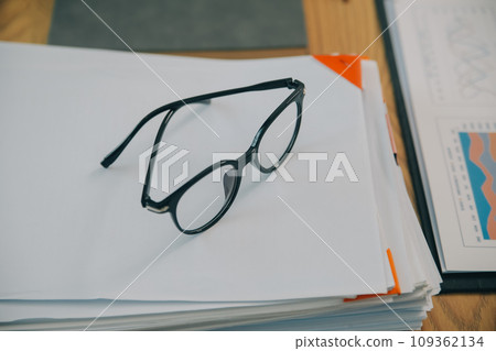 Business team working with new startup project plan and discussion information for financial strategy with laptop and digital tablet in a modern business lounge. 109362134