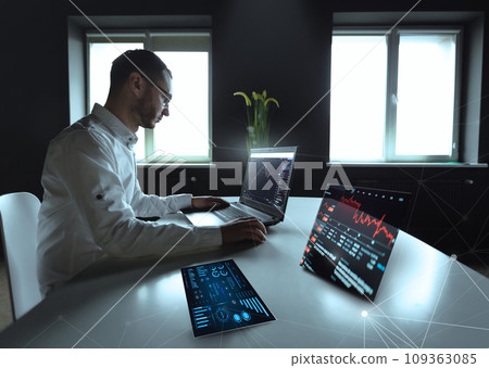 Laptop with abstract forex chart. Digital graph rising and falling, device display . Business corporate communication, stock market changes . Concept of online paying. Home office interior in loft 109363085