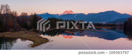 Canadian Mountain Landscape, peaceful river with green trees. Sunny Sunset. 109363797