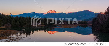 Canadian Mountain Landscape, peaceful river with green trees. Sunny Sunset. Canadian Mountain Landscape, peaceful river with green trees. Sunny Sunset. 109363800