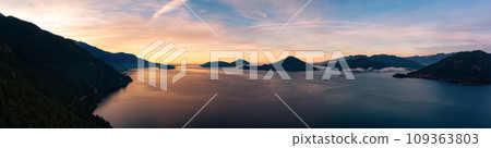Pacific Ocean Coast with Canadian Mountain Landscape. Cloudy Sunrise. 109363803