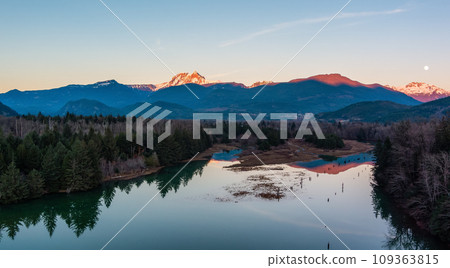 Canadian Mountain Landscape, peaceful river with green trees. Sunny Sunset. 109363815