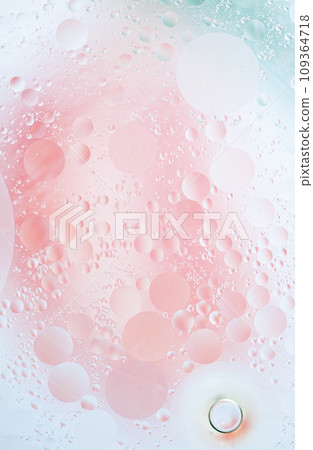 Abstract background in pink soft tones. Macro drops of oil on the Abstract background in pink soft tones. Macro drops of oil on the 109364718
