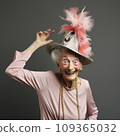 lifestyle photo humor an elderly old dancer with funny hat 109365032