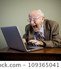 lifestyle photo humor an elderly old man on computer screaming 109365041