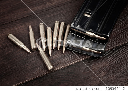 Ammunition with magazine on wooden 109366442