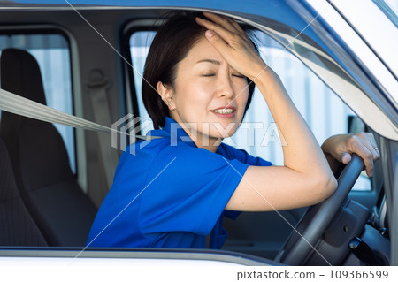 tired female driver tired female driver 109366599