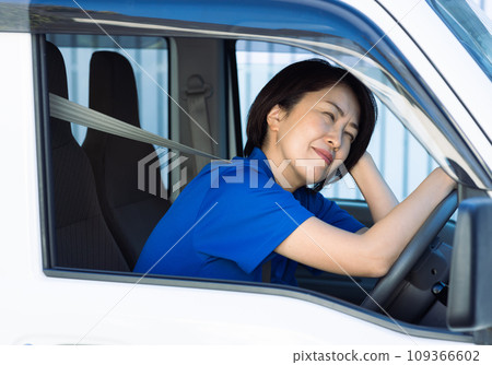 tired female driver 109366602