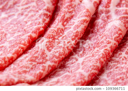 Close-up of beef (thinly sliced Japanese black beef thighs). Close-up of beef (thinly sliced Japanese black beef thighs). 109366711
