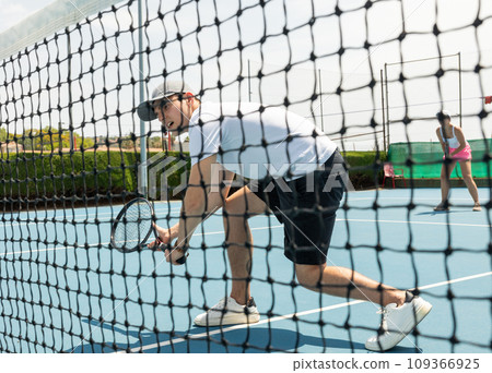 Tennis serve match on hard court 109366925